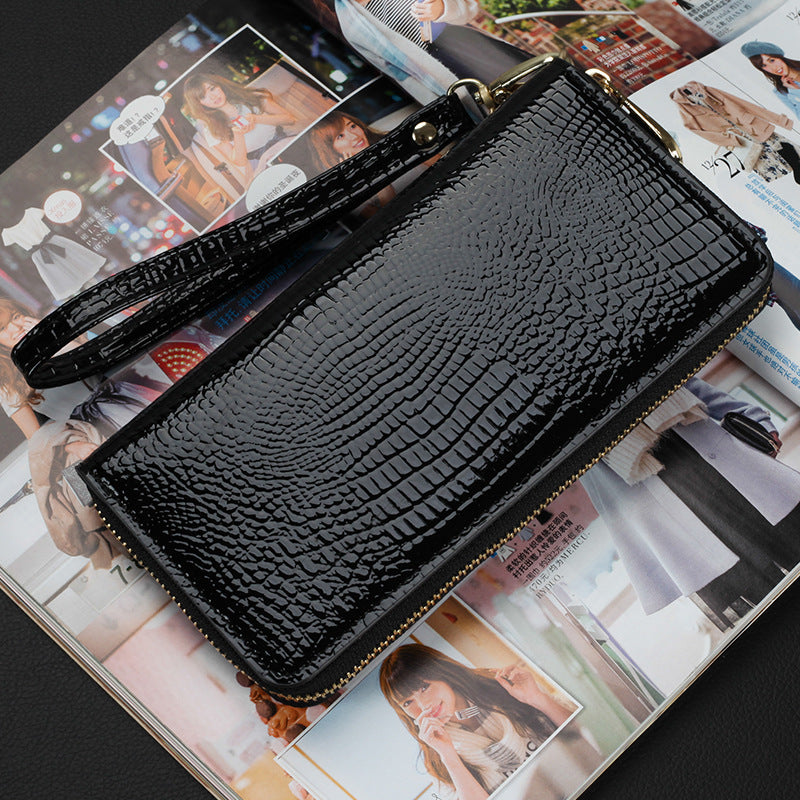 Porte feuille étui téléphone cuir verni noir avec fermeture éclair et bracelet de poignet
