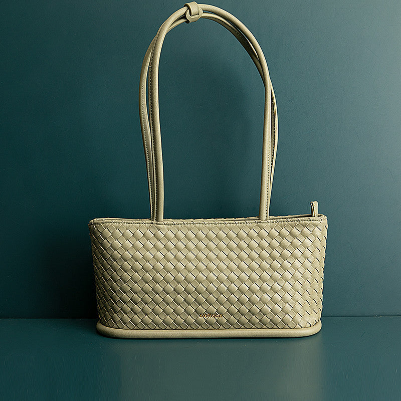 Sac en peau de vache femme bandoulière vintage tressé beige élégant pour un style unique