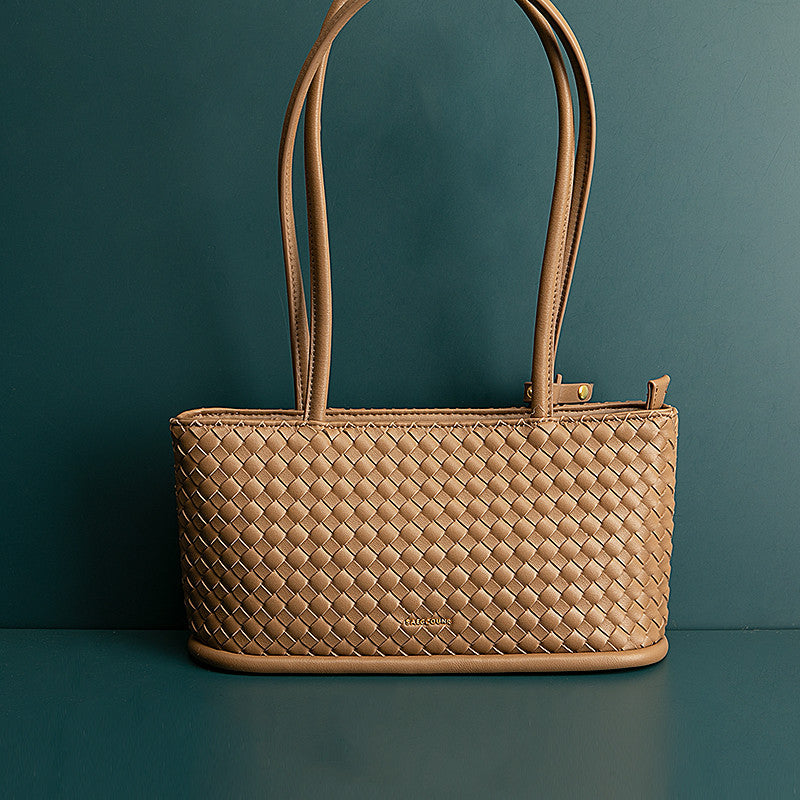Sac en peau de vache femme bandoulière vintage tressé de couleur camel par Liaisondirecte.com