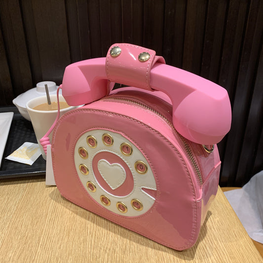 Sac téléphone fille mignon rose en forme de téléphone vintage avec cœur au centre