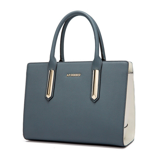 Sac à main cuir contrasté bleu et blanc avec poignées doubles et détails dorés Liaisondirecte.com