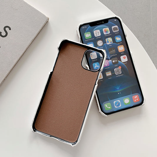 Coque téléphone cuir crocodile marron pour iPhone avec protection renforcée et design élégant