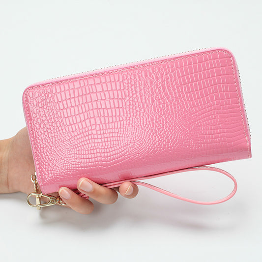 Étui téléphone cuir verni rose avec fermeture éclair et bracelet de poignet Liaisondirecte.com