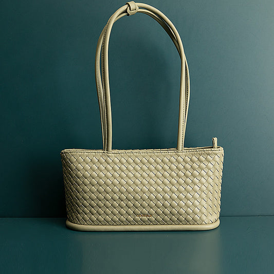 Sac en peau de vache femme bandoulière vintage tressé beige élégant pour un style unique