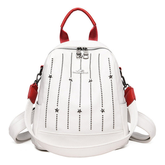 Sac à dos en cuir femme blanc clouté avec détails étoiles et anses rouges élégant